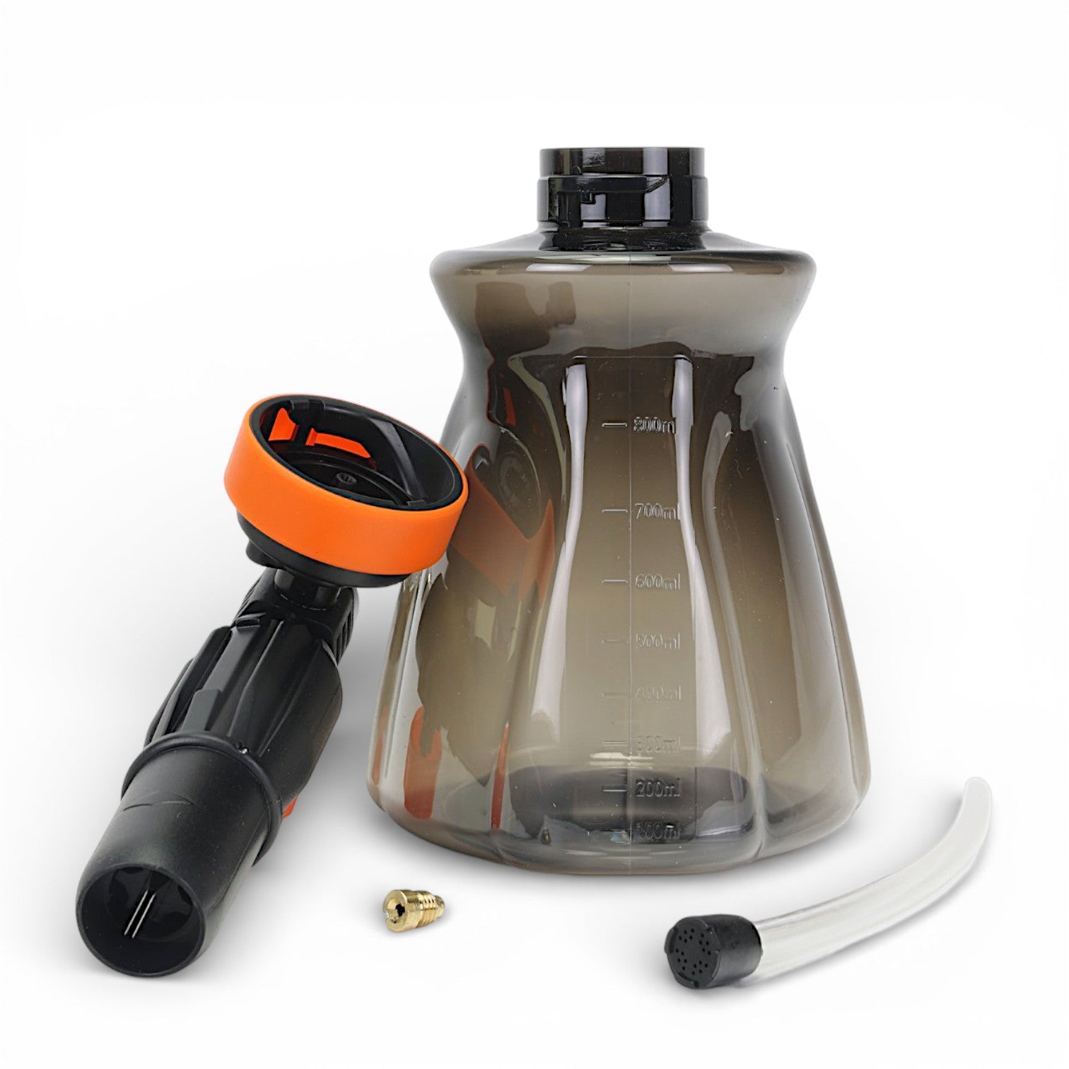 Clear spray bottle with black and orange nozzle on a white background