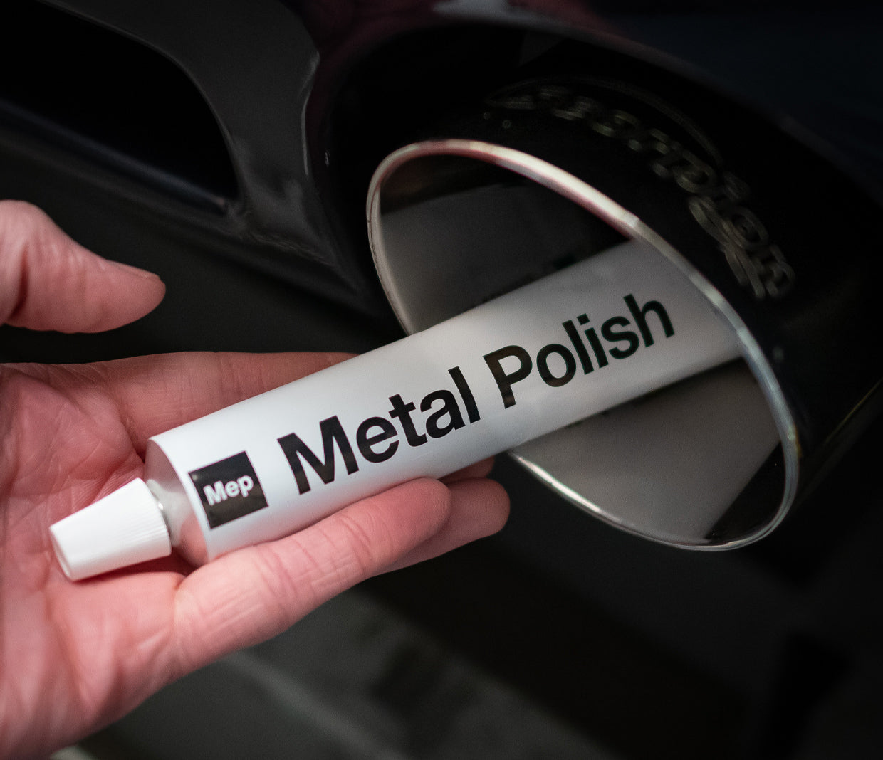 Koch Chemie Metal Polish MEP with a freshly polished exhaust tip