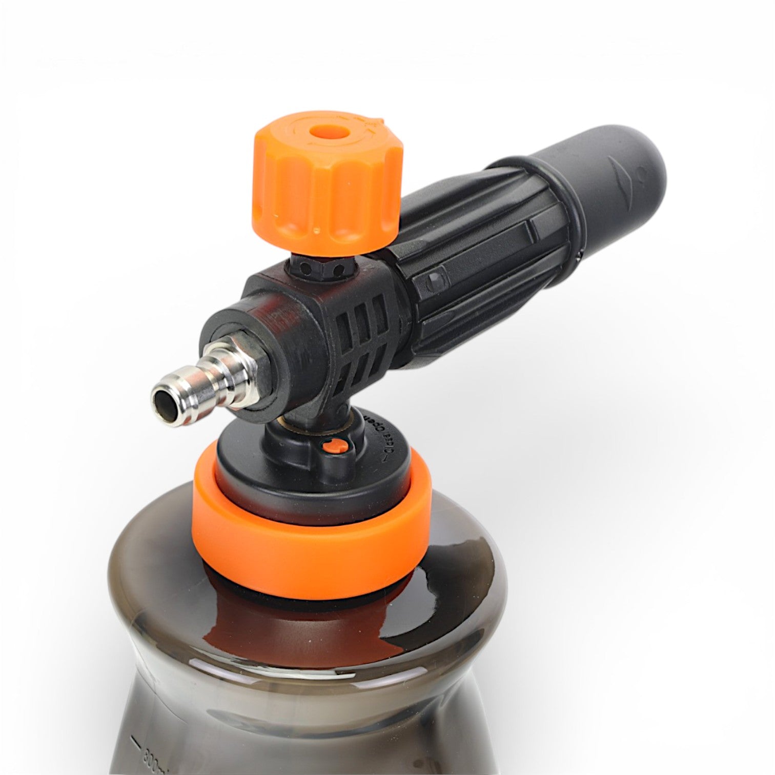Foam lance with orange nozzle and black body on a white background