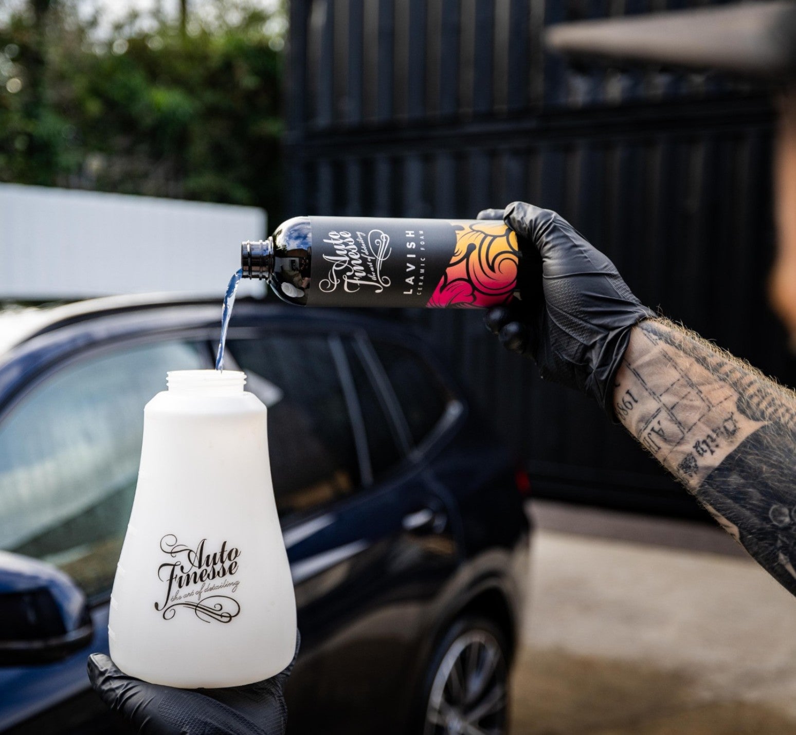 Auto Finesse Lavish being added to a snow foam lance