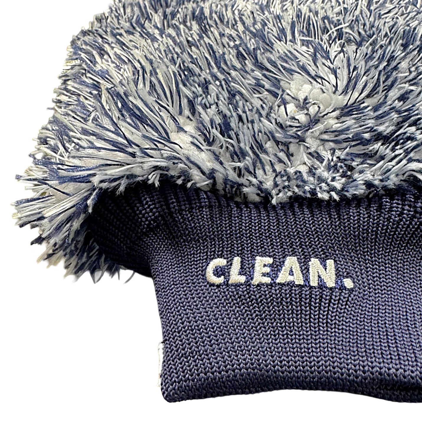 Dark blue pet coat with fluffy hood and 'CLEAN.' text on a white background